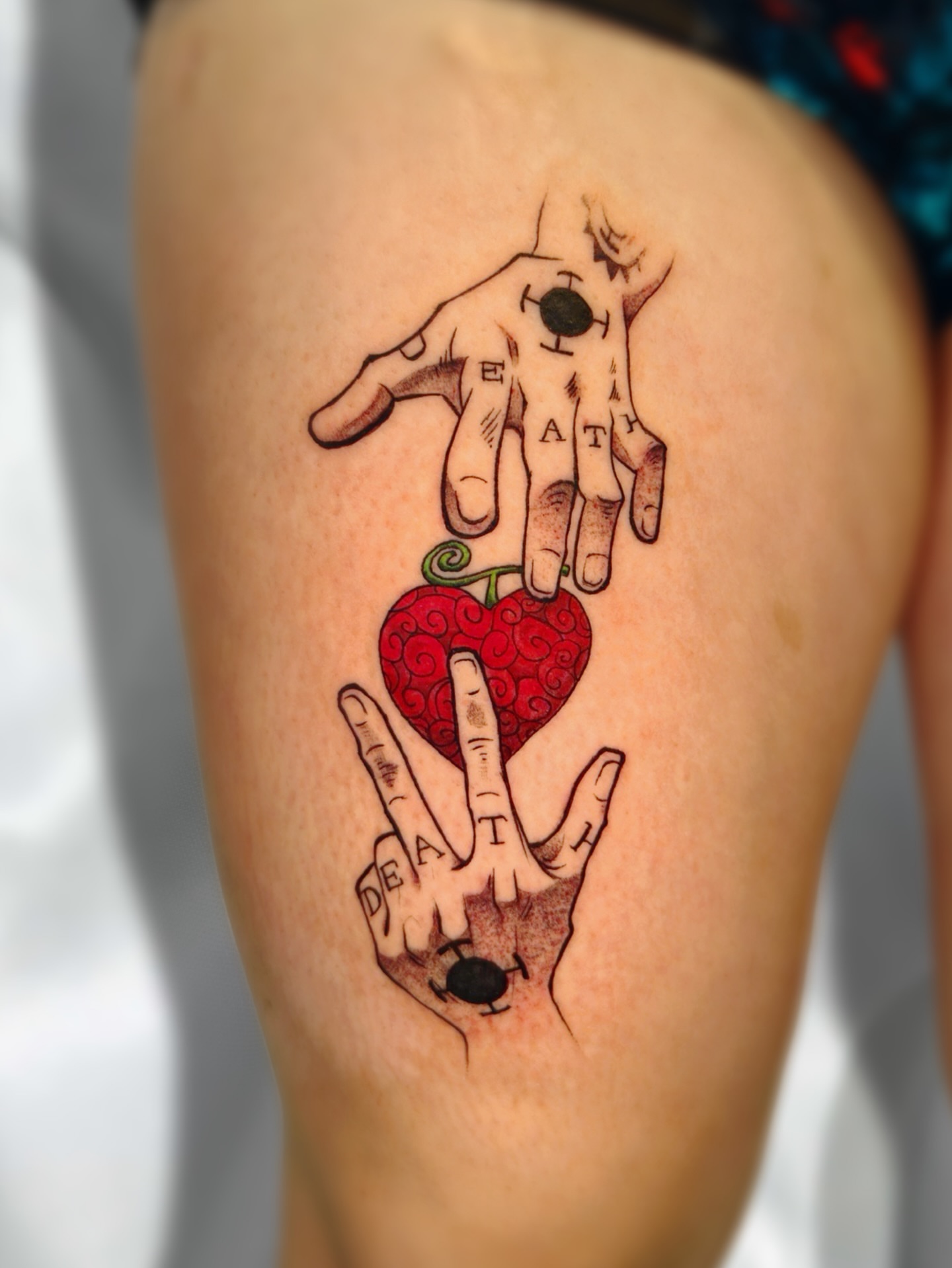 Hands holding heart neo-traditional tattoo on the thigh by Lex