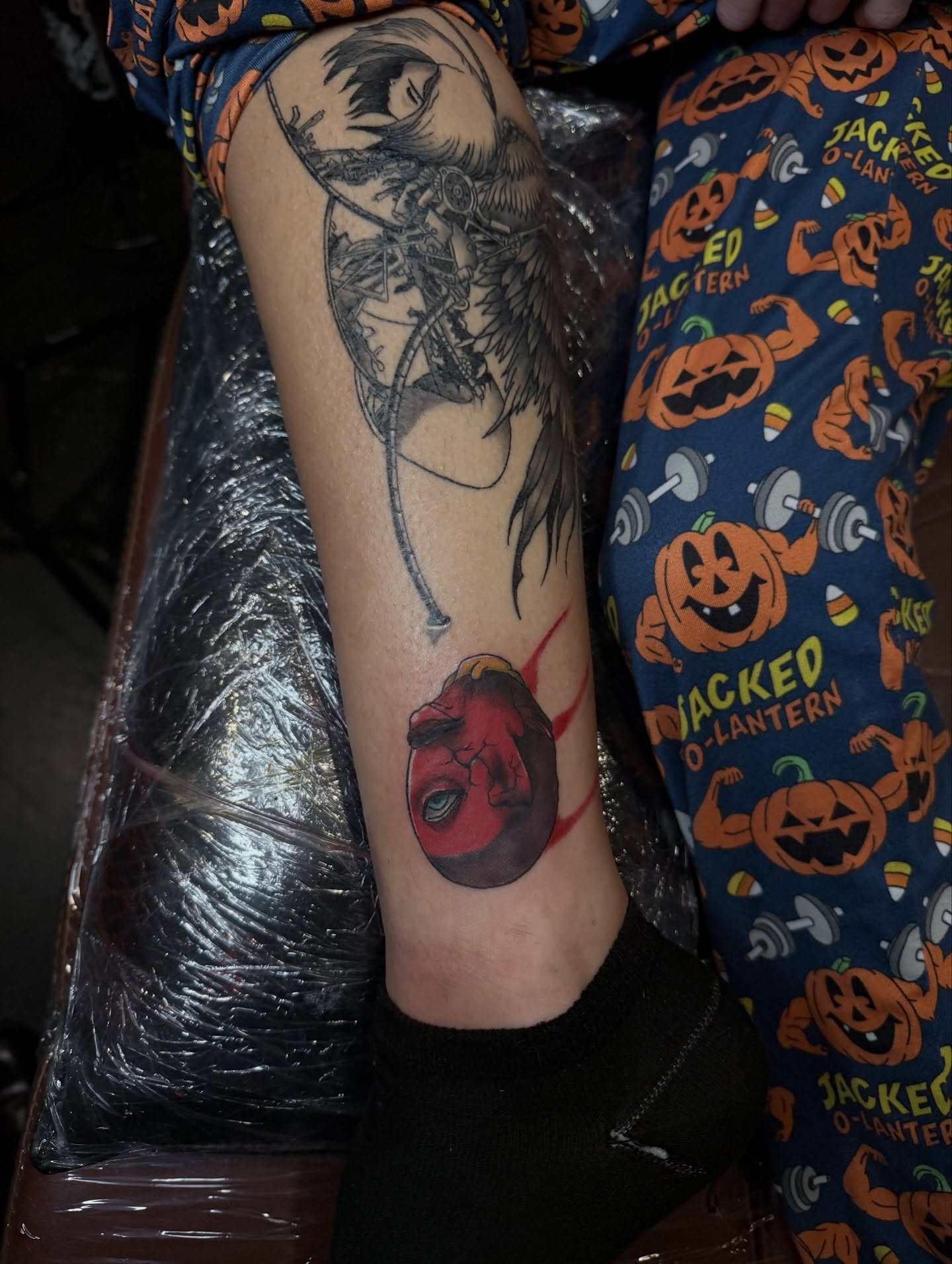 Demon head dotwork tattoo on the forearm by Denis Seregin