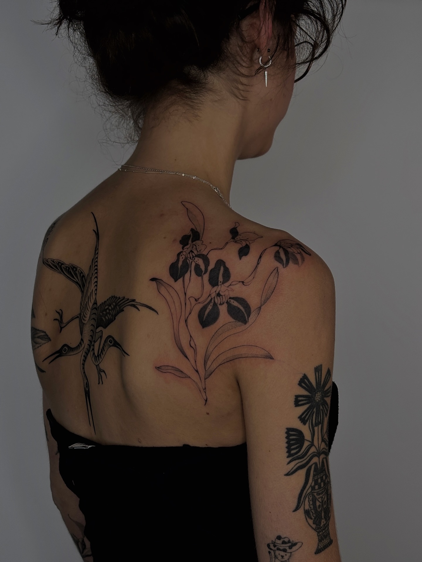 Birds and flowers black and grey tattoo on the back by sago, Berkeley, California