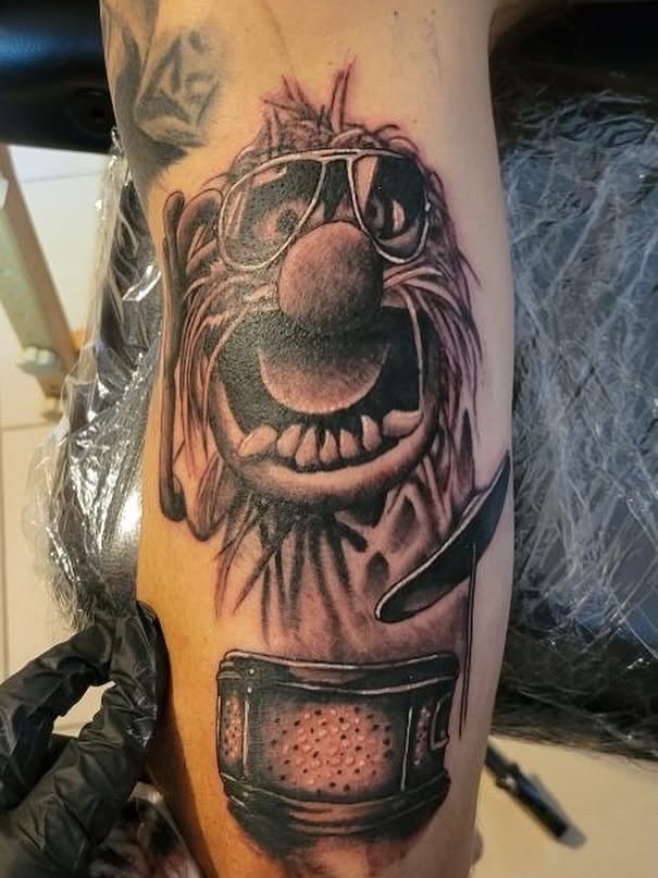 Clown realism tattoo on the forearm by Ben Cecil, Summerville, South Carolina