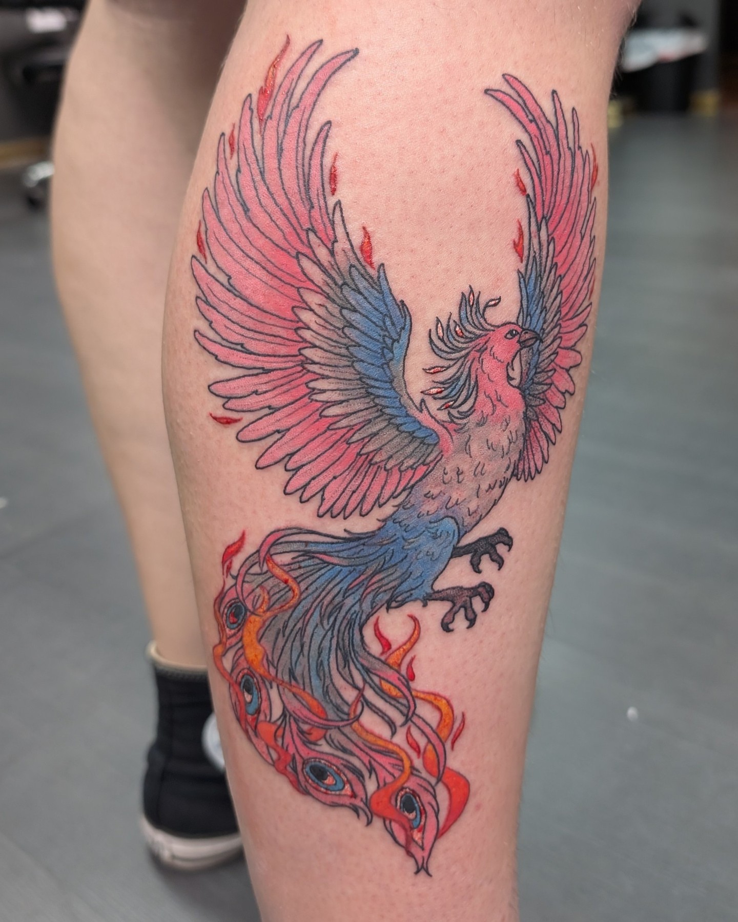 Phoenix neo-traditional tattoo on the thigh by Trinity Renee