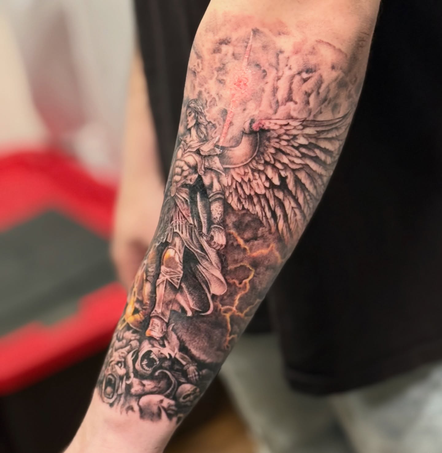 Angelic warrior realism tattoo on the forearm by Tatum