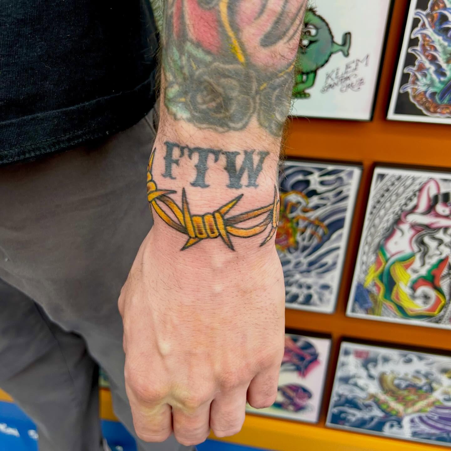 Barbed wire and FTW American traditional tattoo on the forearm by Lip™