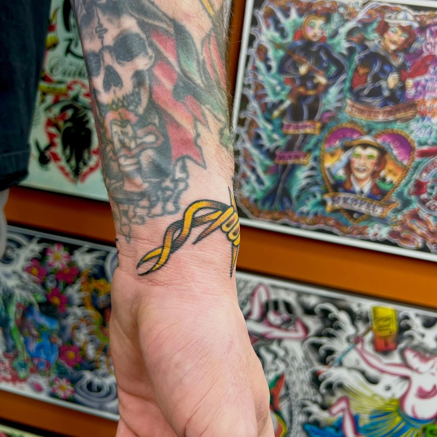 Snake American traditional tattoo on the forearm by Lip™