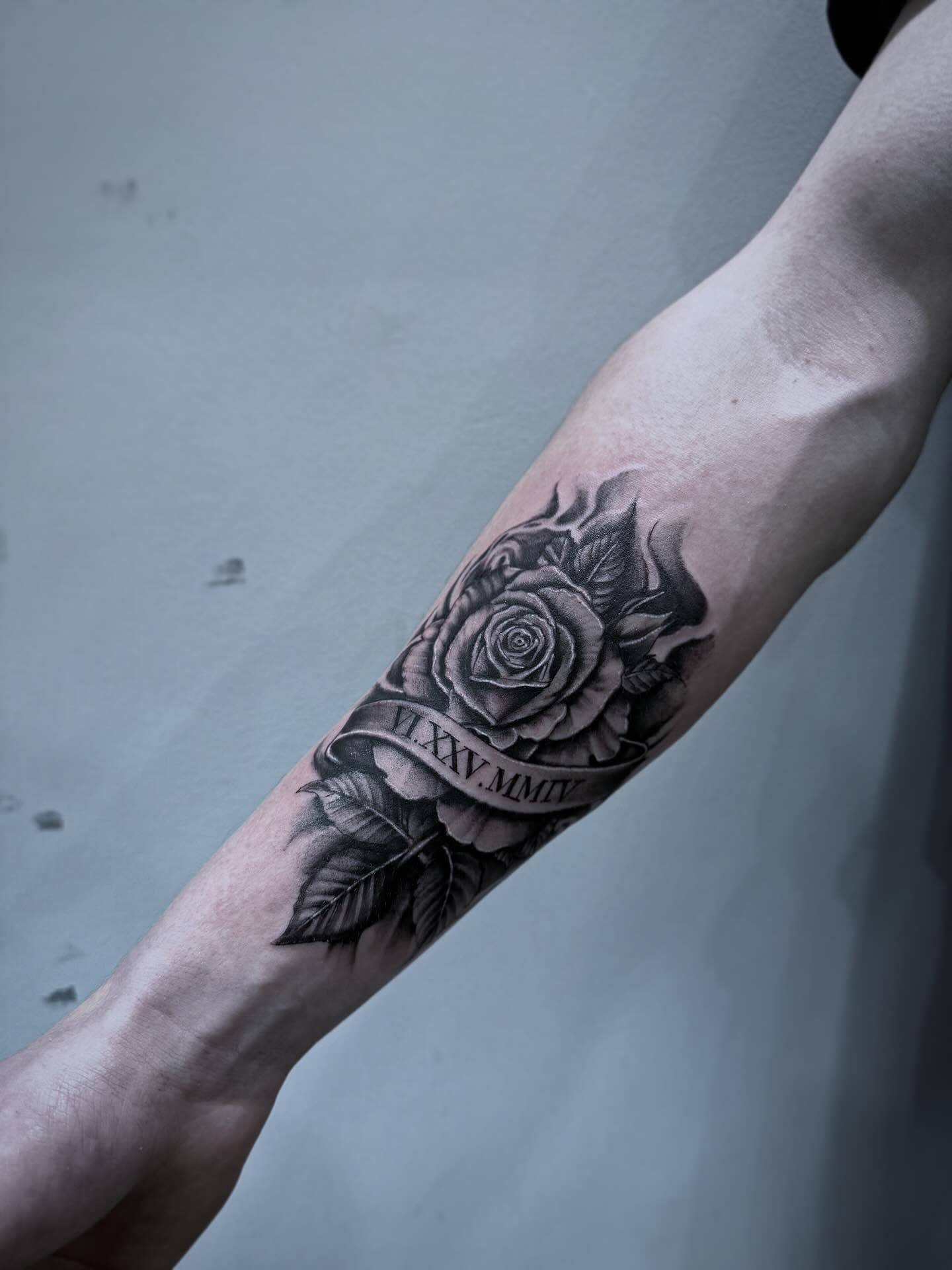 Rose realism tattoo on the forearm by Tattoo Ottawa