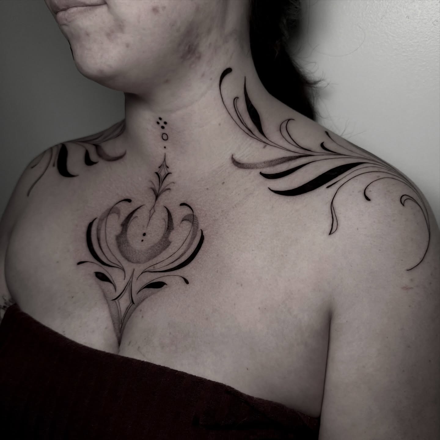 Floral design ornamental tattoo on the chest by ɪᴠᴏɴɴᴇ