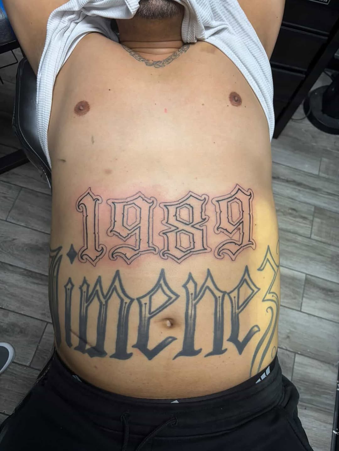 1989 Jimenez Chicano tattoo on the torso by Renzoe_piercingz