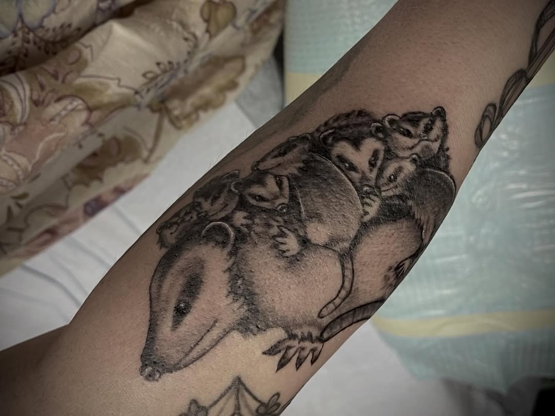 Opossum and babies realism tattoo on the forearm by Ashly Hutchens, Richmond, Virginia