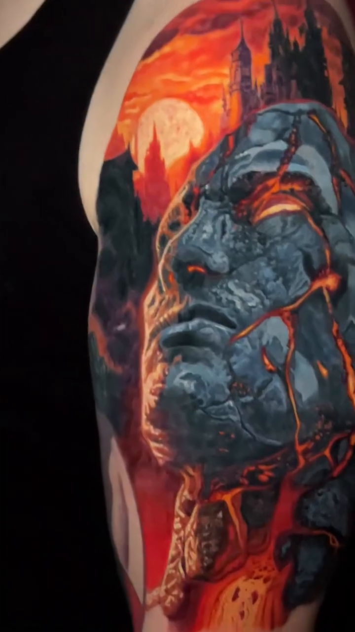 Stone face with lava realism tattoo by Sean Foy