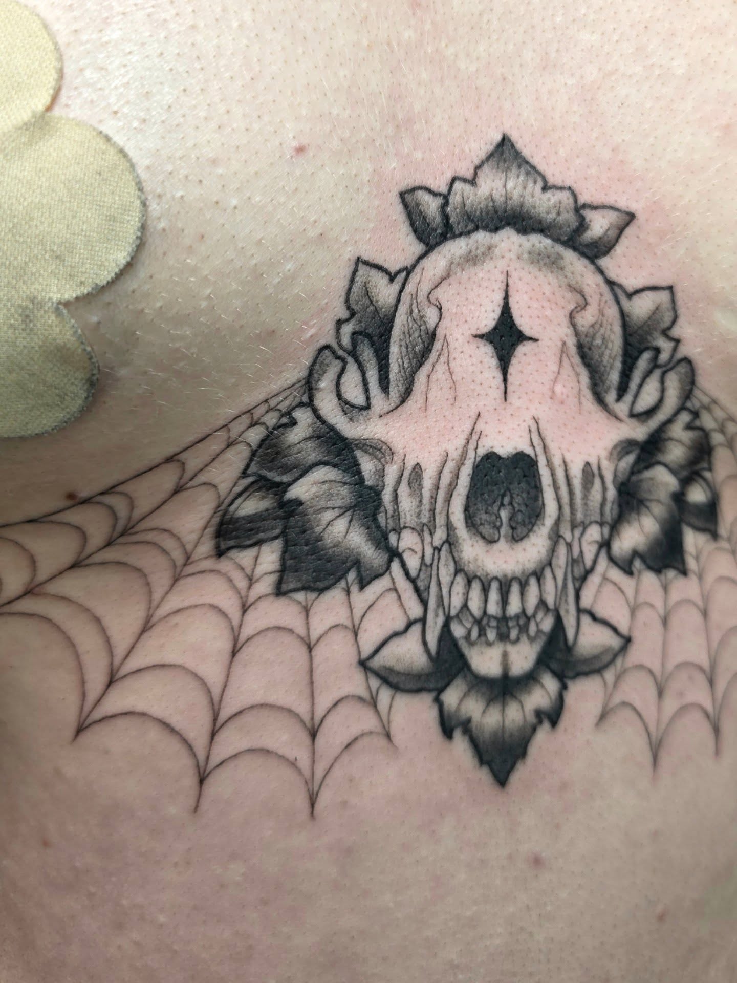 Skull black and grey tattoo on the chest by April High ☆ Tattoo Artist