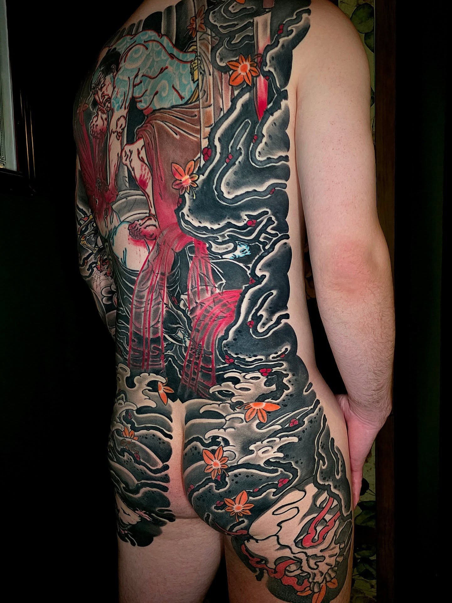 Geisha and waves japanese irezumi tattoo on the back by Frank Simanton