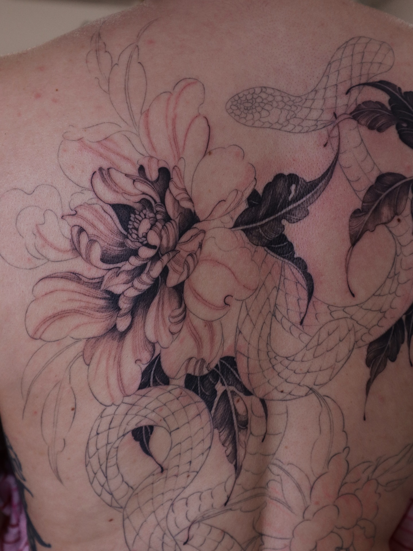 Tattoo by @maid.of.flowers — black_and_grey, realism
