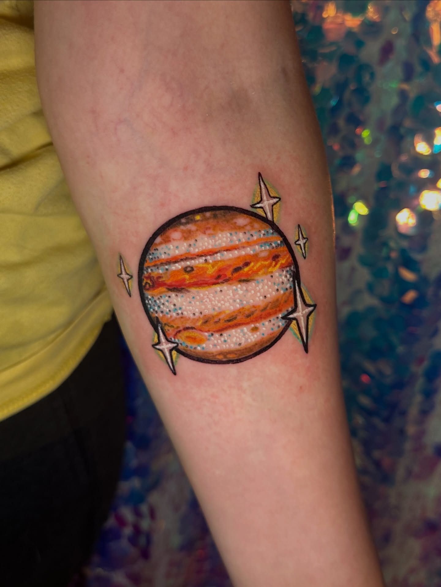 Jupiter dotwork tattoo on the forearm by Sunny, Austin, Texas