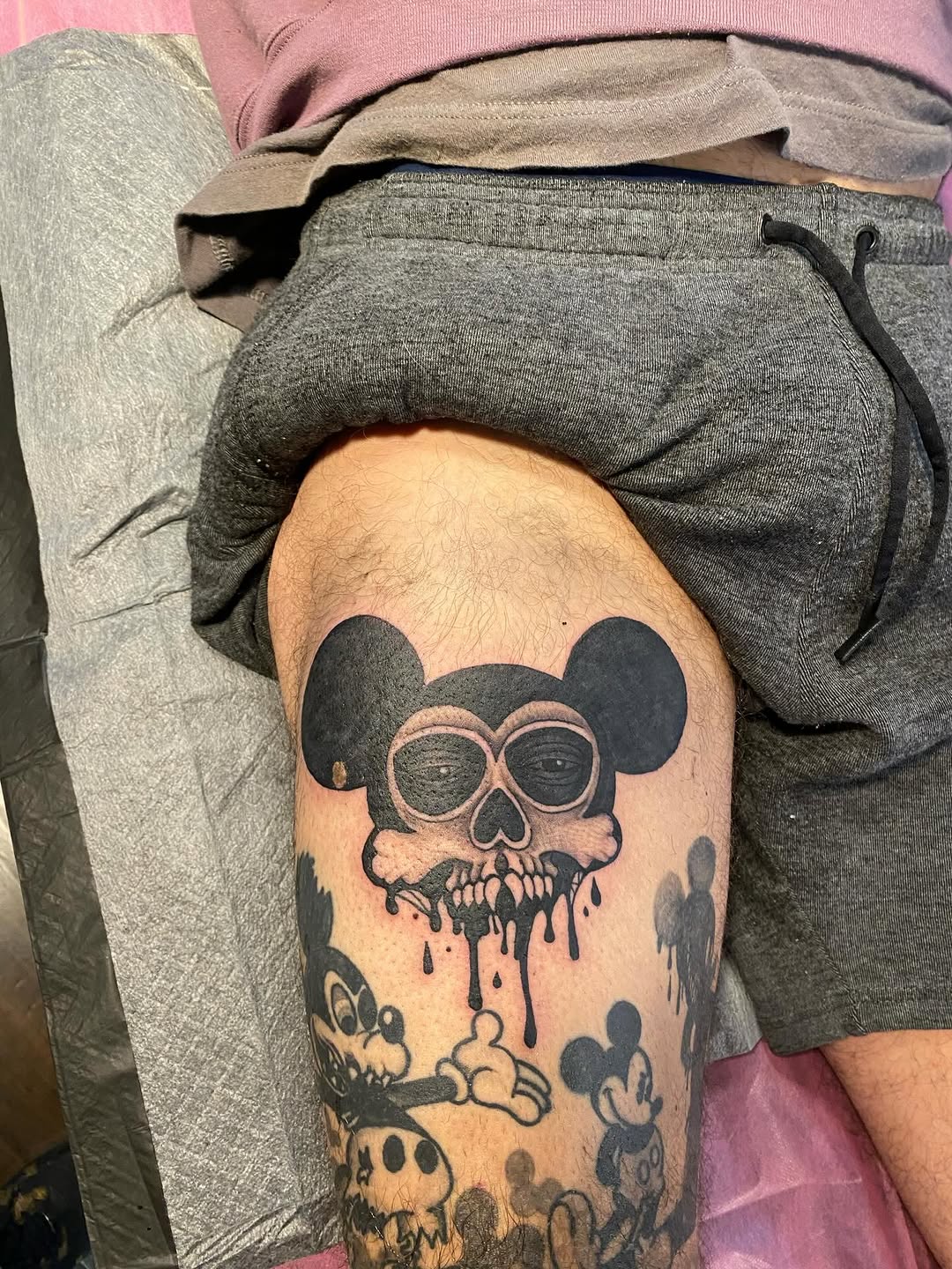 Mickey Mouse skull realism tattoo on the thigh by jim collins, Dayton, Ohio