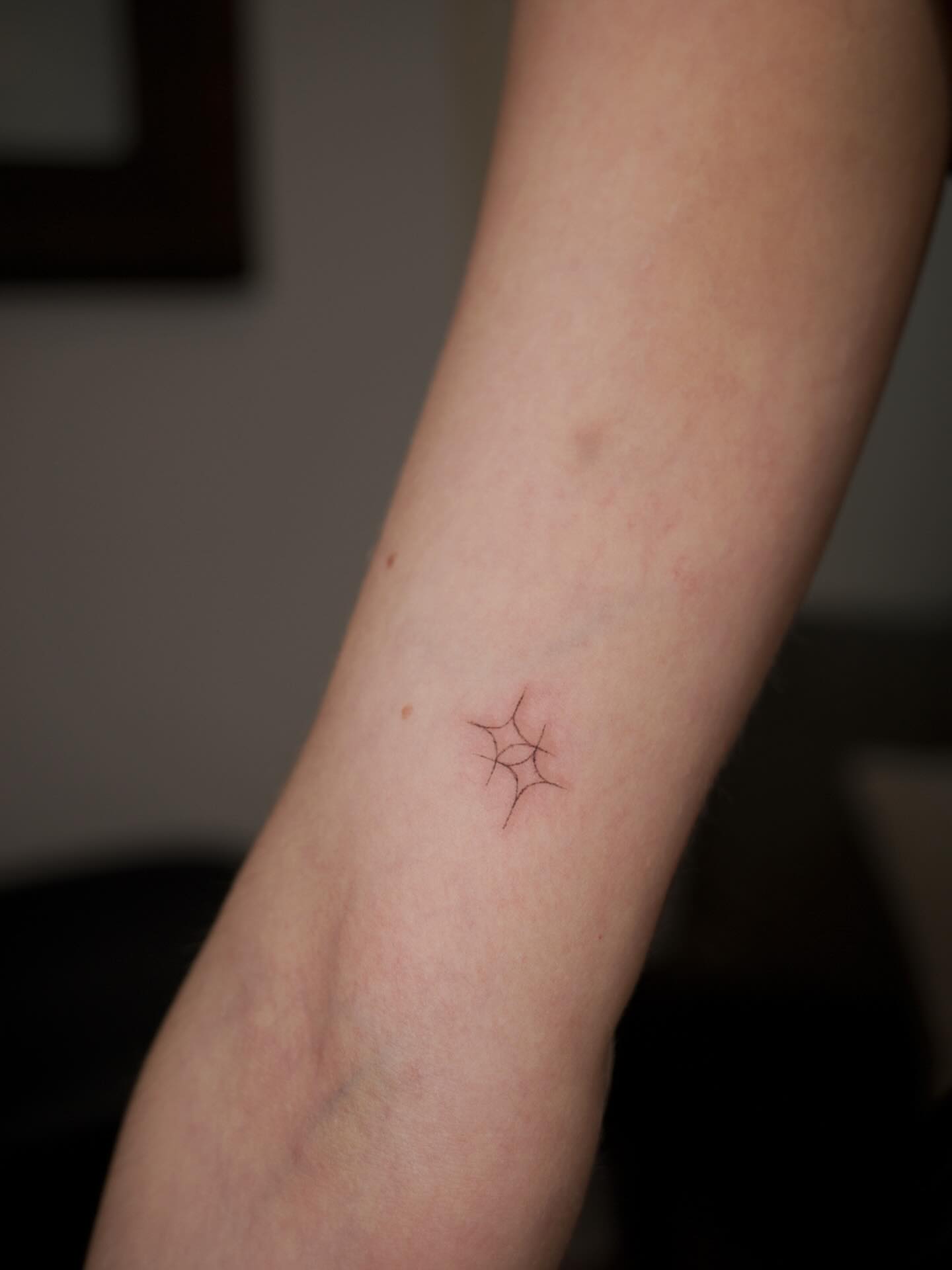 Spider web geometric tattoo on the forearm by It’s ya girl, KB