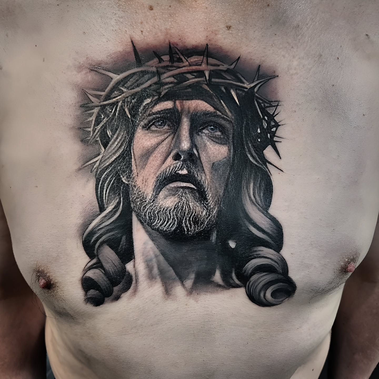 Jesus Christ realism tattoo on the chest by "El Jose" Tattoo