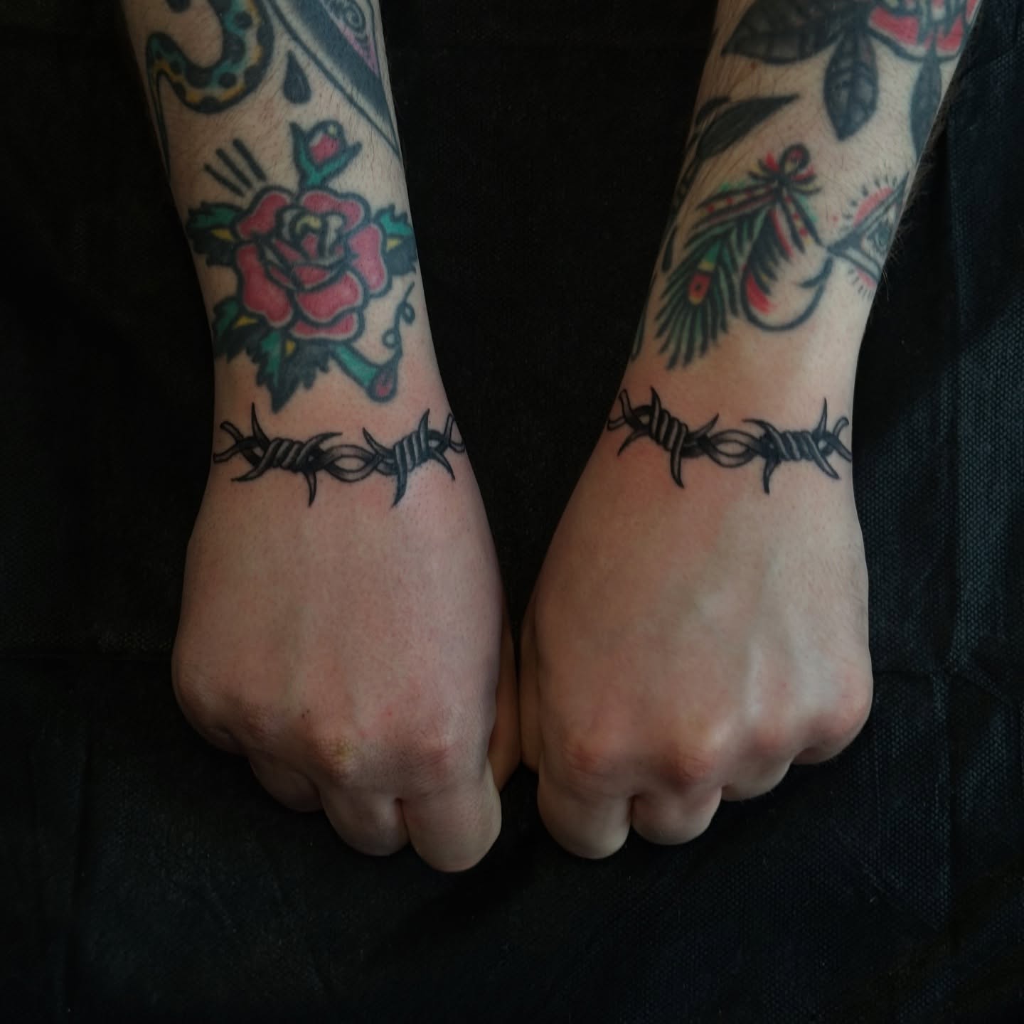 Barbed wire American traditional tattoo on the forearm by Victoria