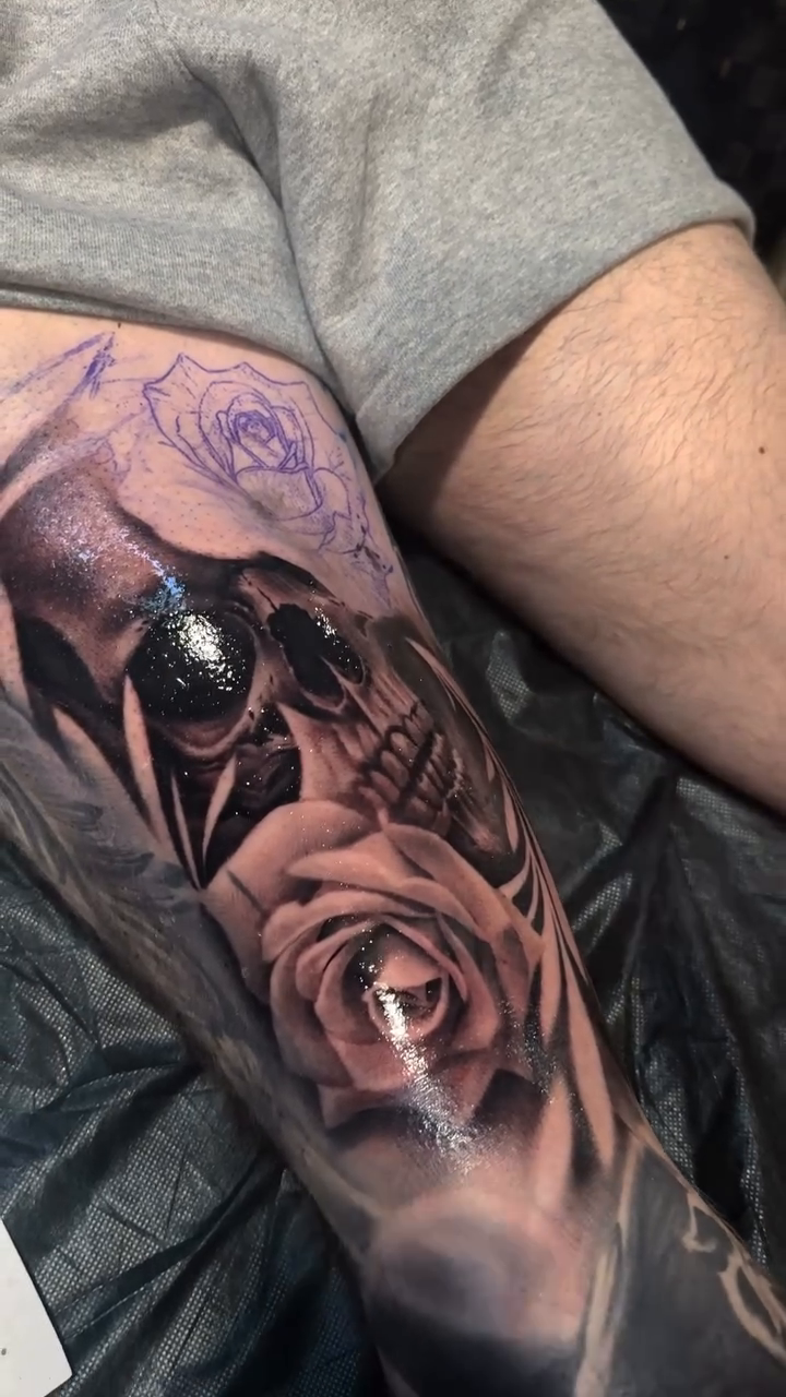 Skull and roses realism tattoo by Martin Reyes Jr
