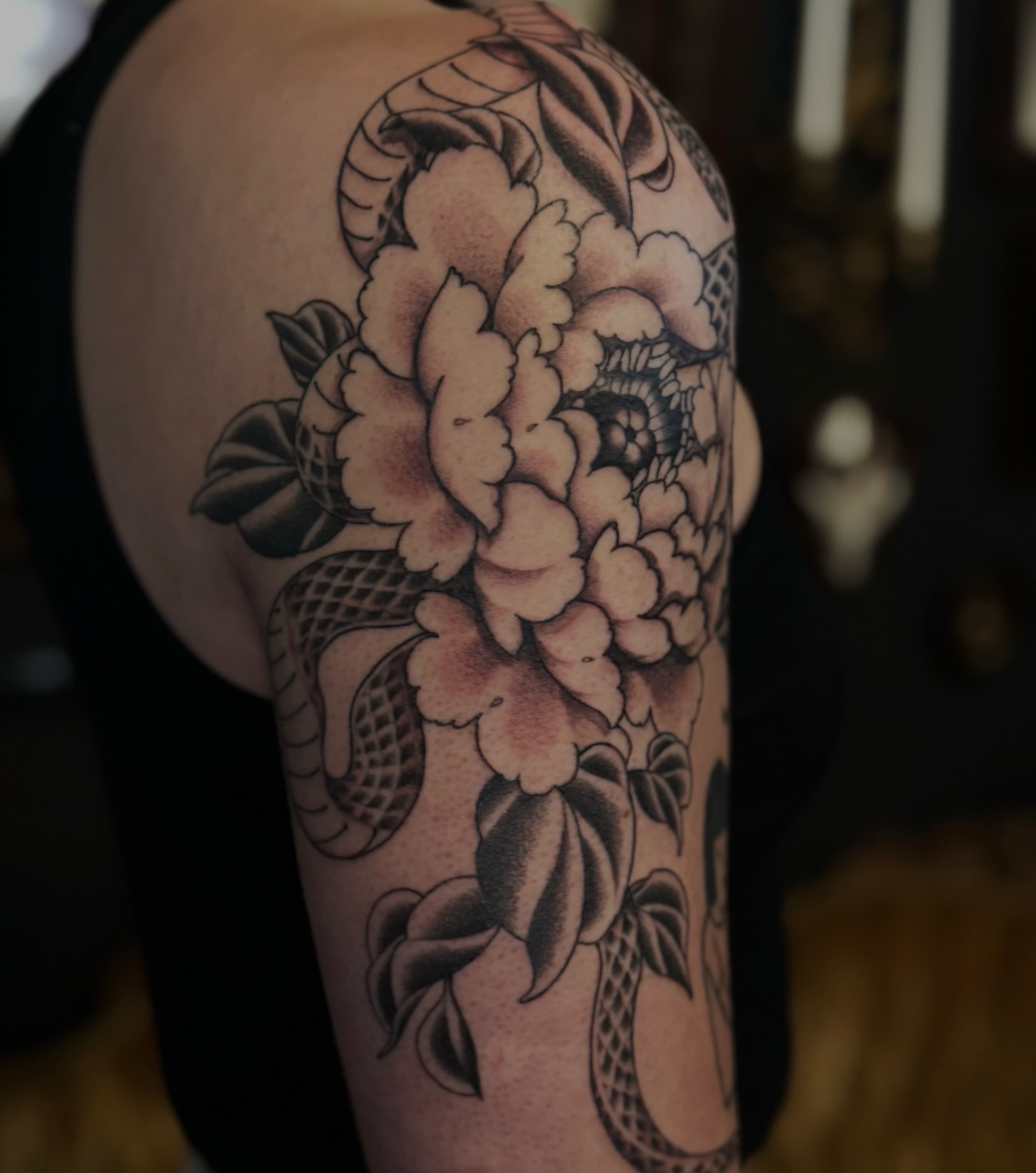Snake and peony American traditional tattoo on the forearm by Virginia 🥀Neo Traditional