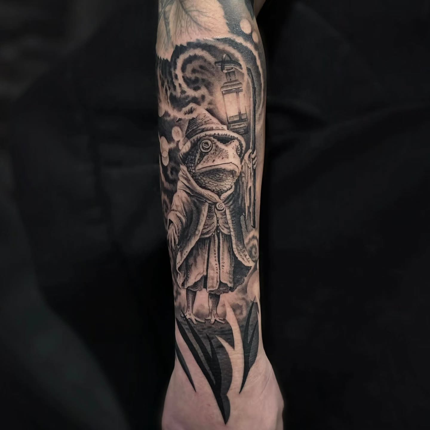 Fish in robe realism tattoo on the forearm by Julia Oravets