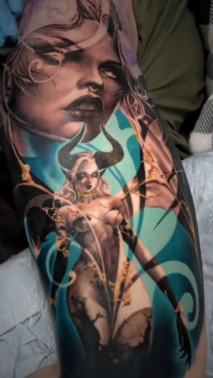 Woman with horns and chains realism tattoo by Noelin Wheeler