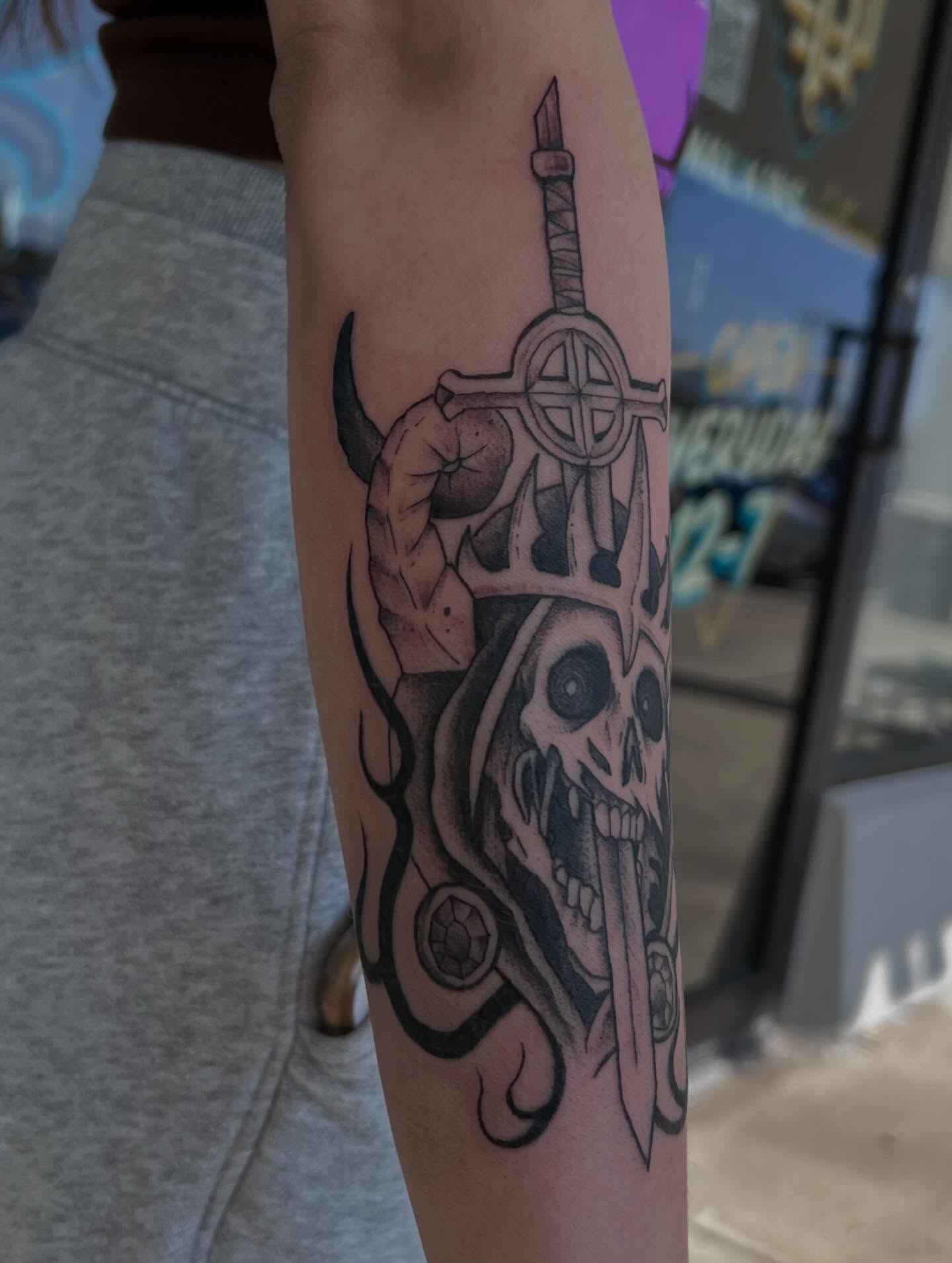 Skull with sword realism tattoo on the forearm by Callie πͺ