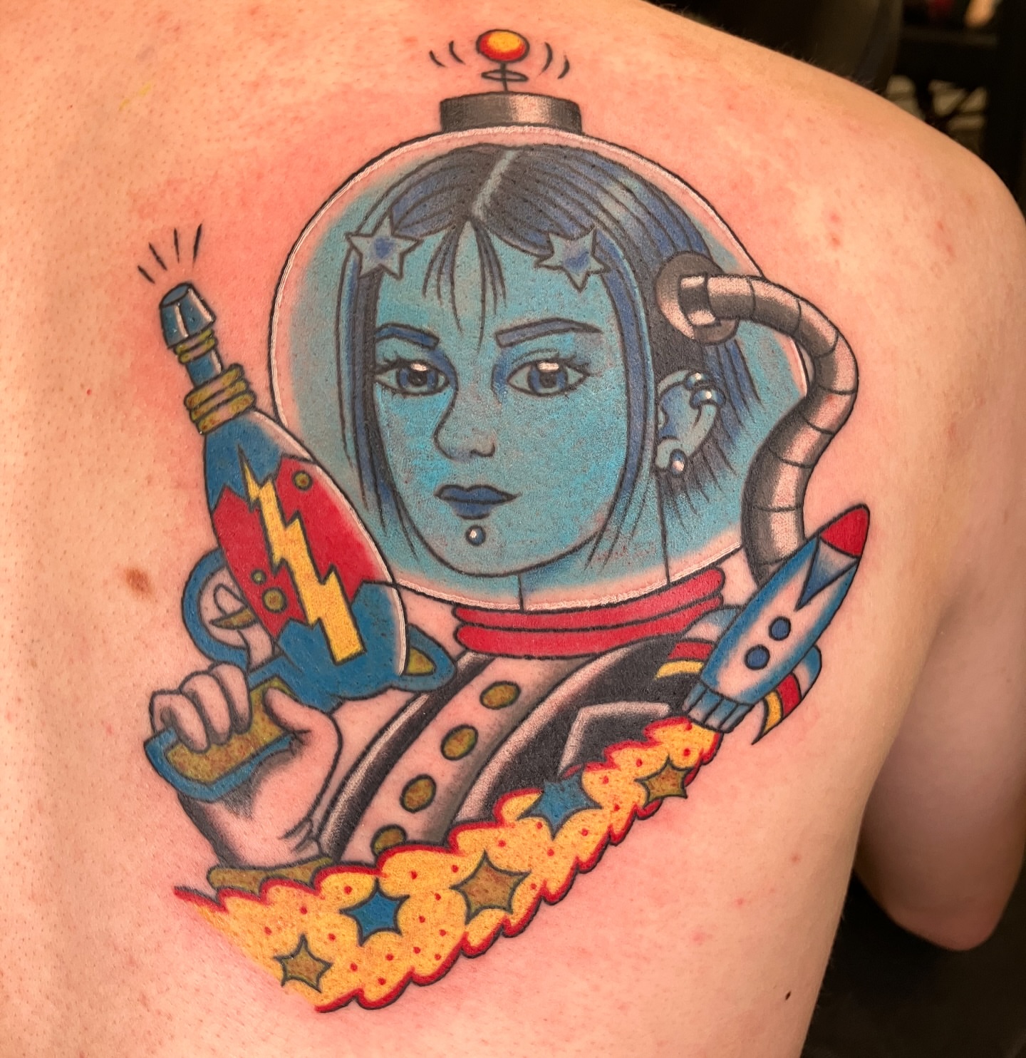 Astronaut girl American traditional tattoo on the shoulder by maddie mcghee, Memphis, Tennessee