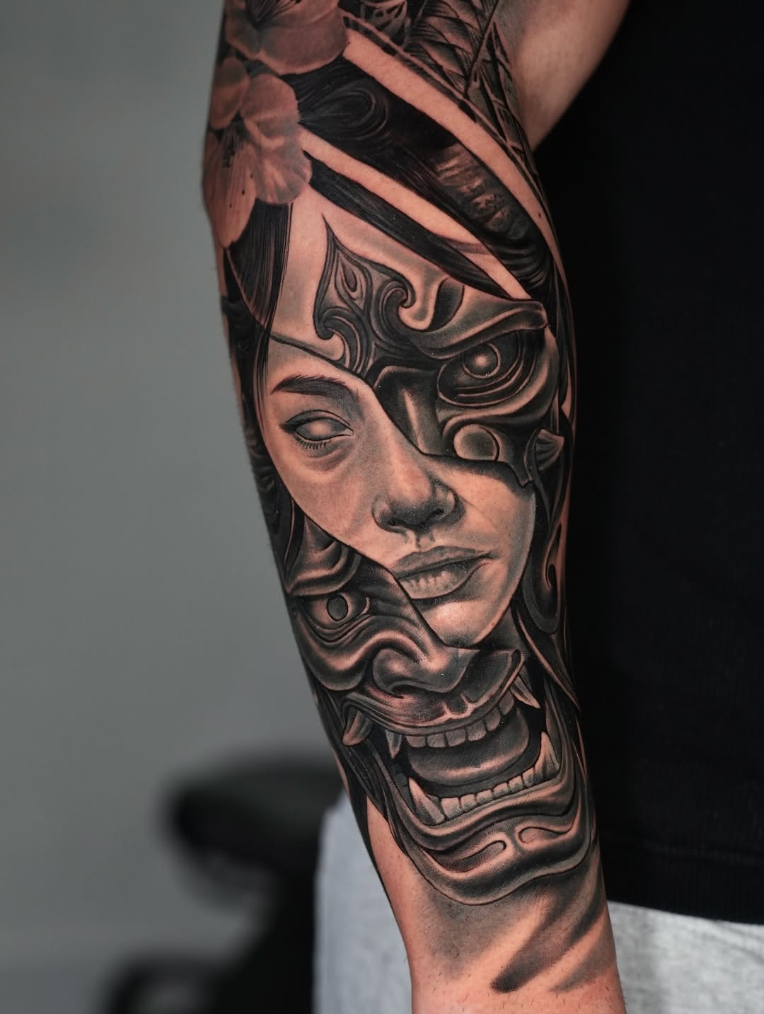 Woman and demon mask Japanese tattoo on the forearm by Luis Manuel Olivera, North Miami, Florida