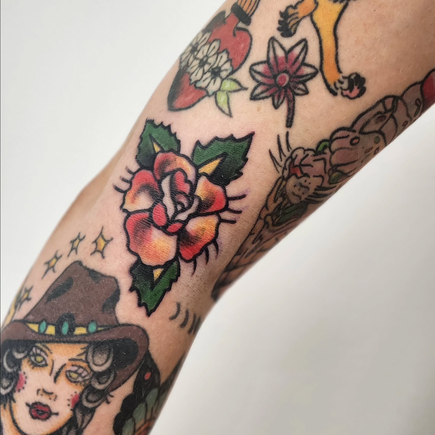 Floral bouquet American traditional tattoo on the forearm by Sonya ๐ฟ๐ธ๐พ
