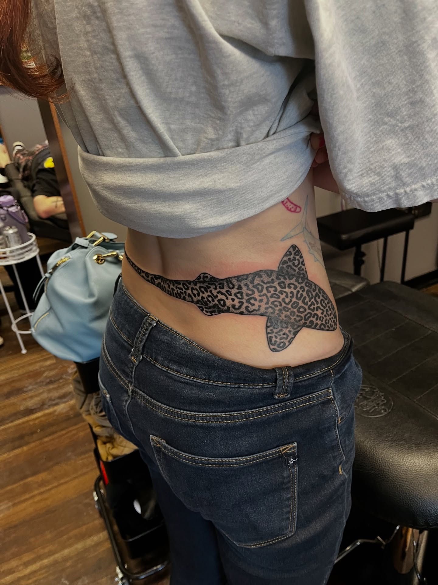 Leopard shark black and grey tattoo on the torso by Autumn Westbrook, Mentor, Ohio