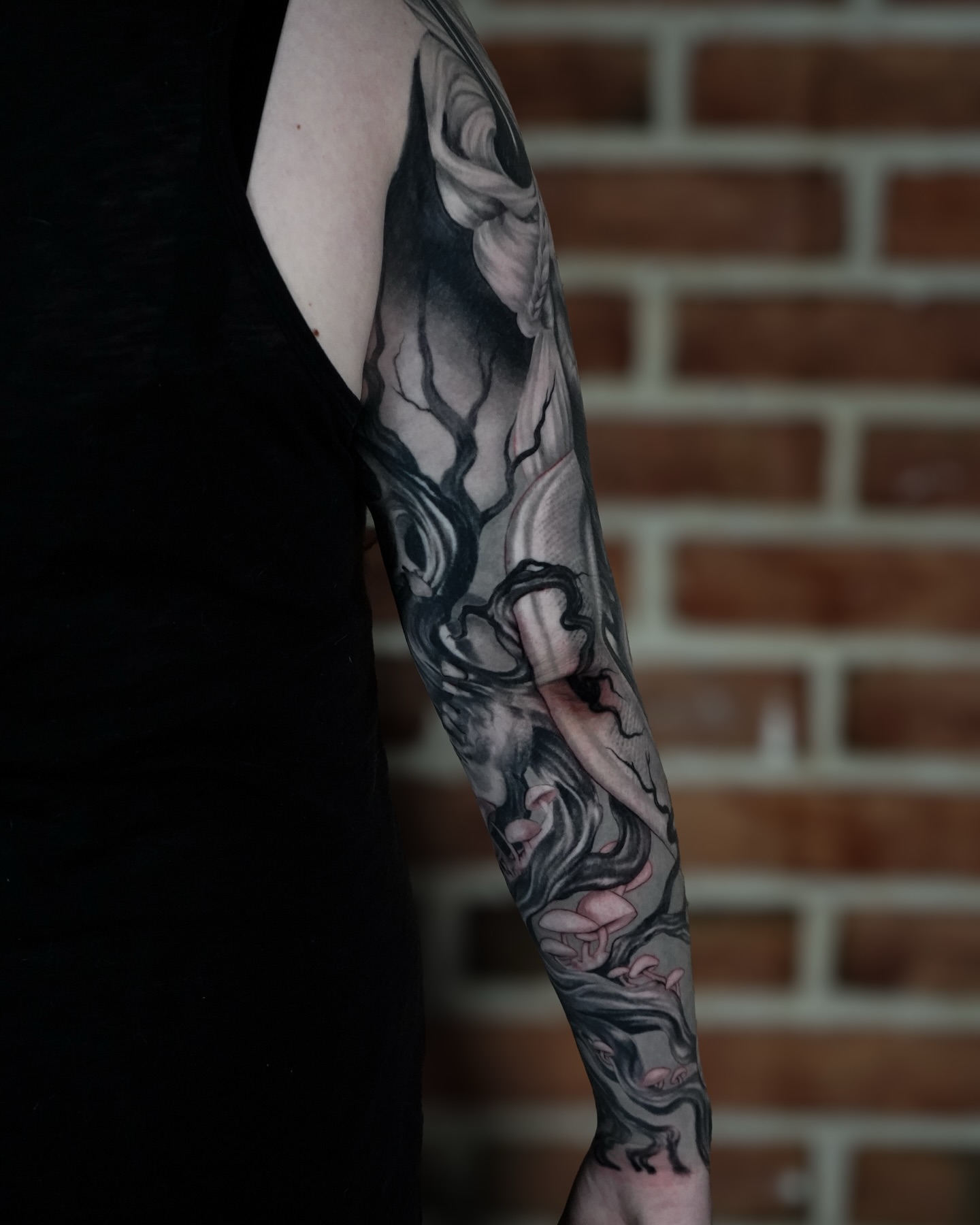 Tattoo by @sunseritattoo — black_and_grey, dark_realism