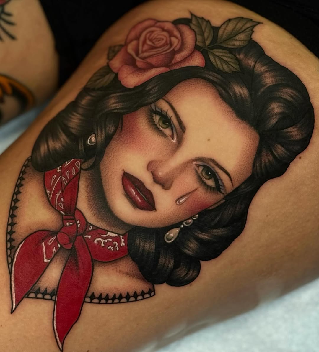Crying woman with rose and bandana neo-traditional tattoo on the upper arm by Luna Lucero