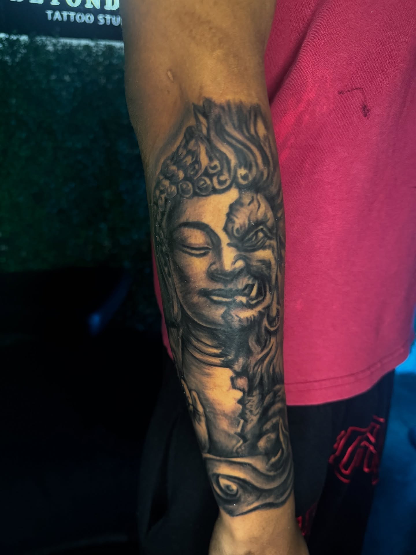 Buddha head realism tattoo on the forearm by Dallas Tattoo Artist📍