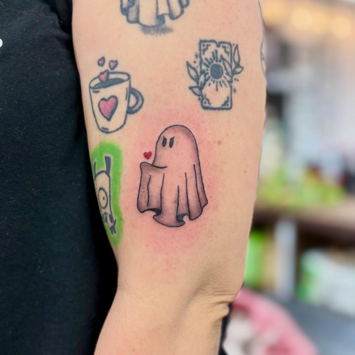 Ghost mug flower dotwork tattoo on the forearm by bradyn thornton: eco-tattoo artist