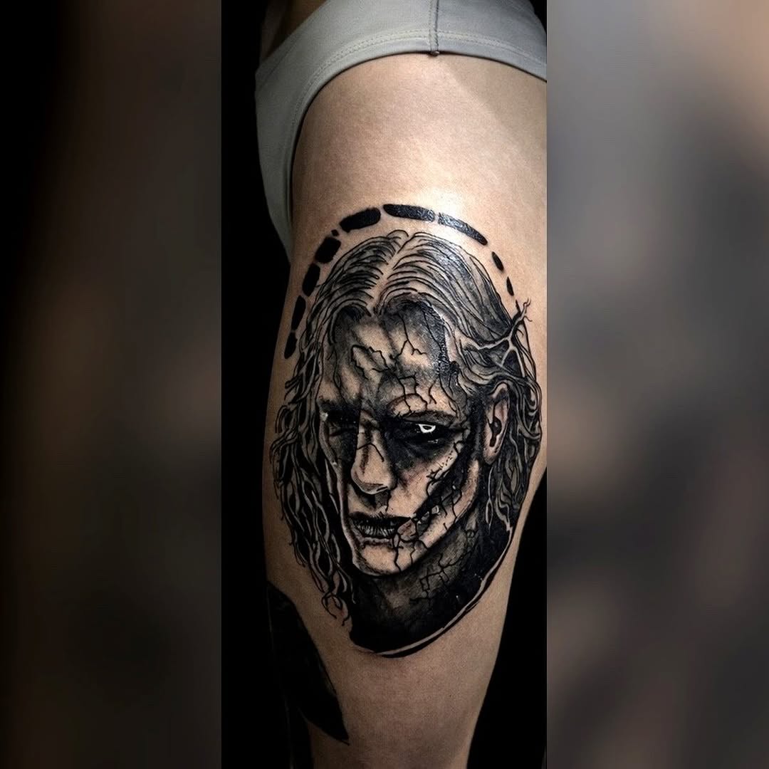 Creepy portrait realism tattoo on the thigh by K Valentine