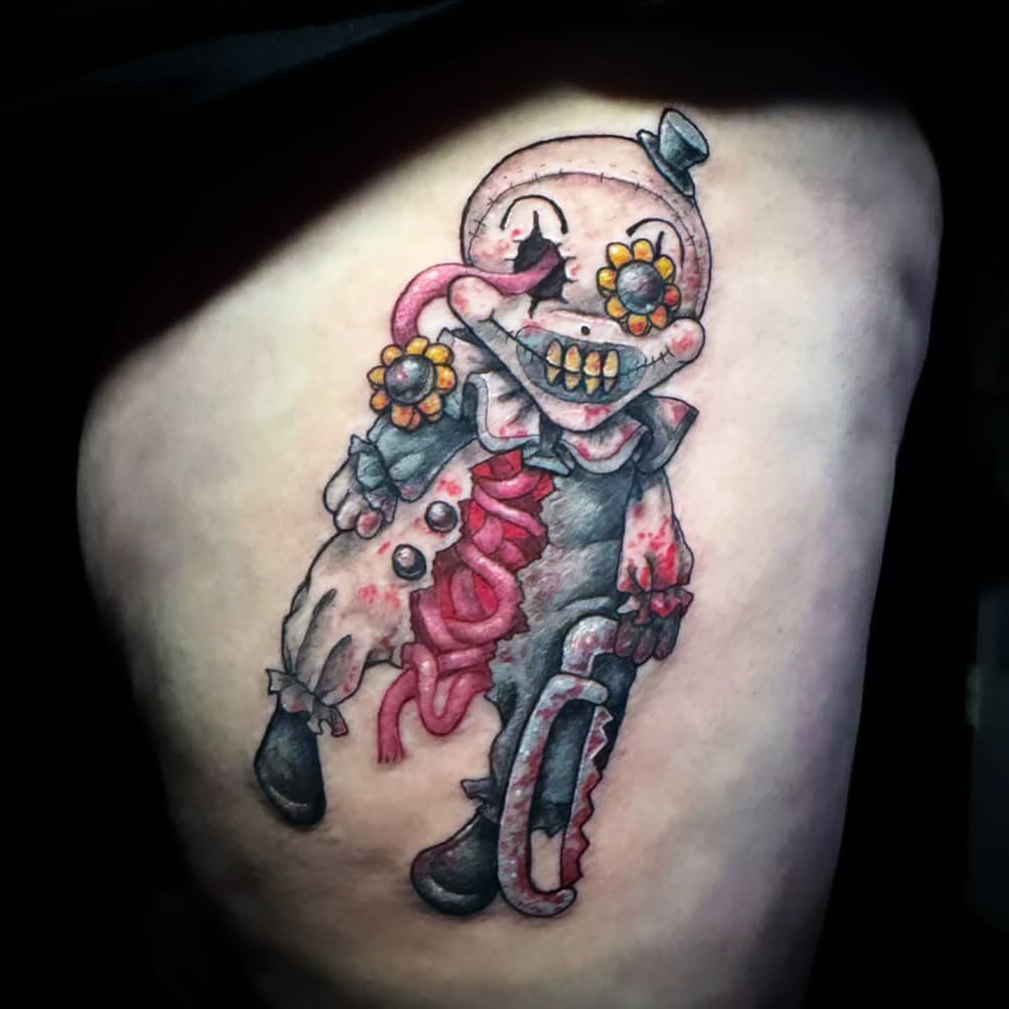 Clown American traditional tattoo on the thigh by Jennalea