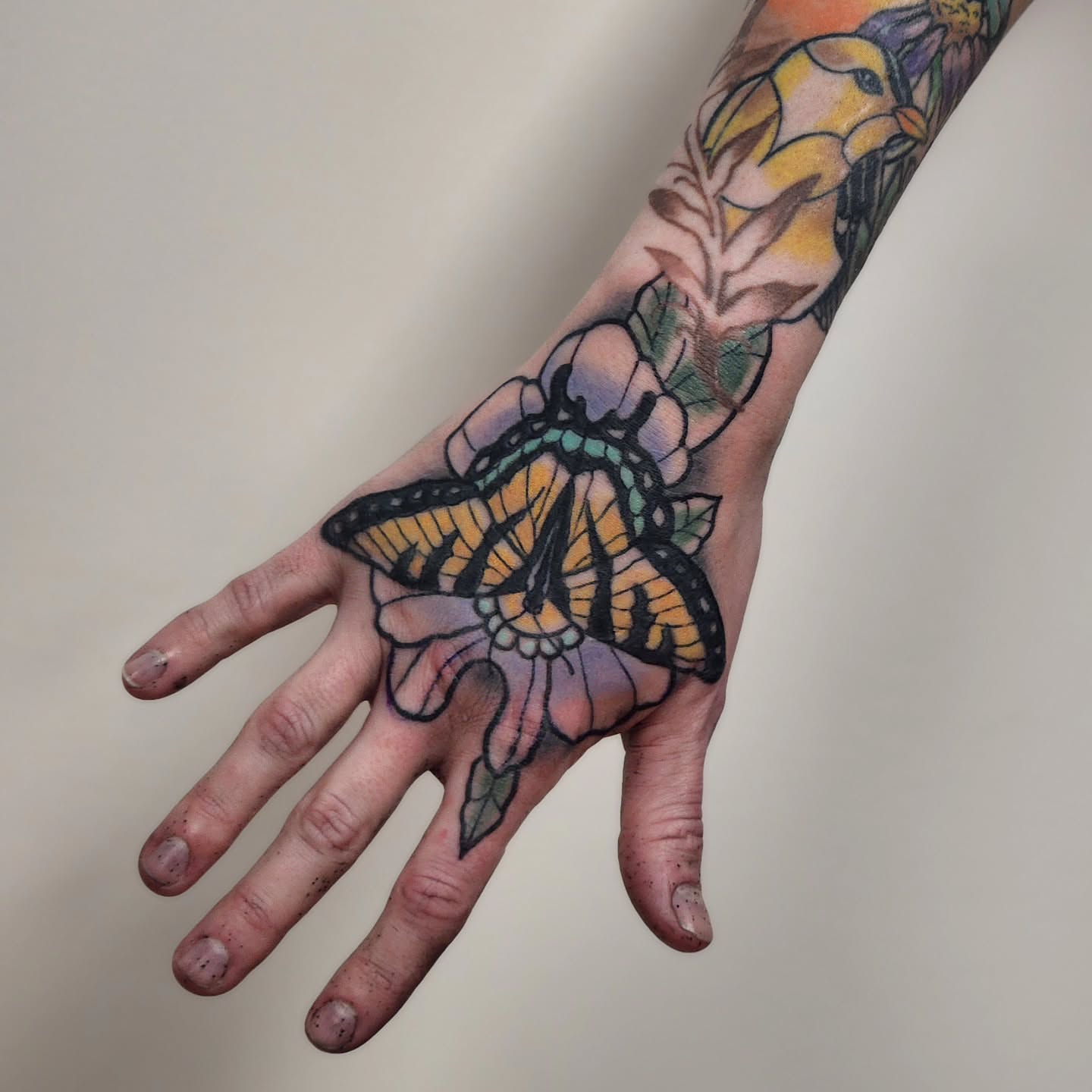 Monarch butterfly American traditional tattoo on the hand by Sonya ๐ฟ๐ธ๐พ