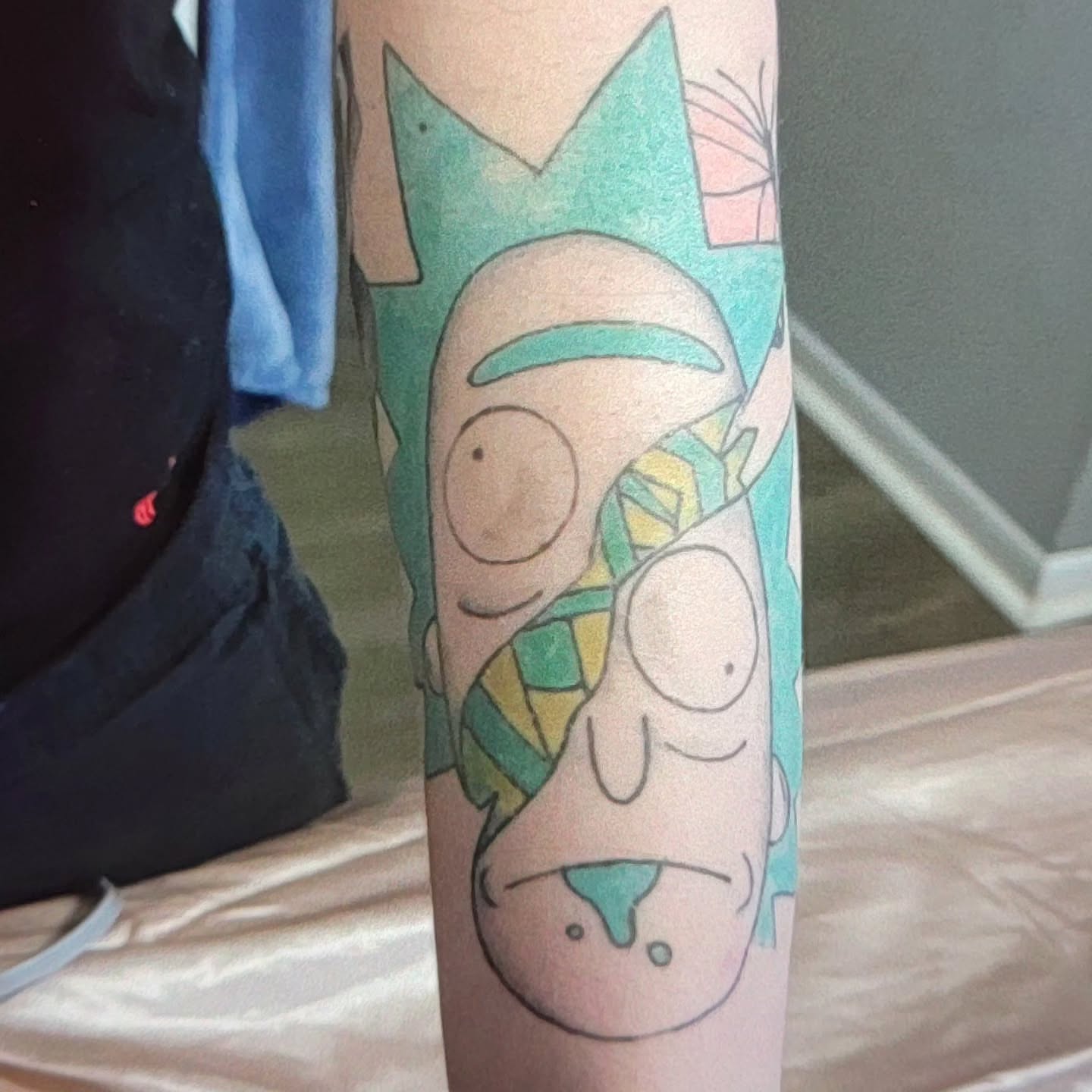 Rick and morty new school tattoo on the forearm by Melissa Does Tattoos - Bright, Bold Anime &