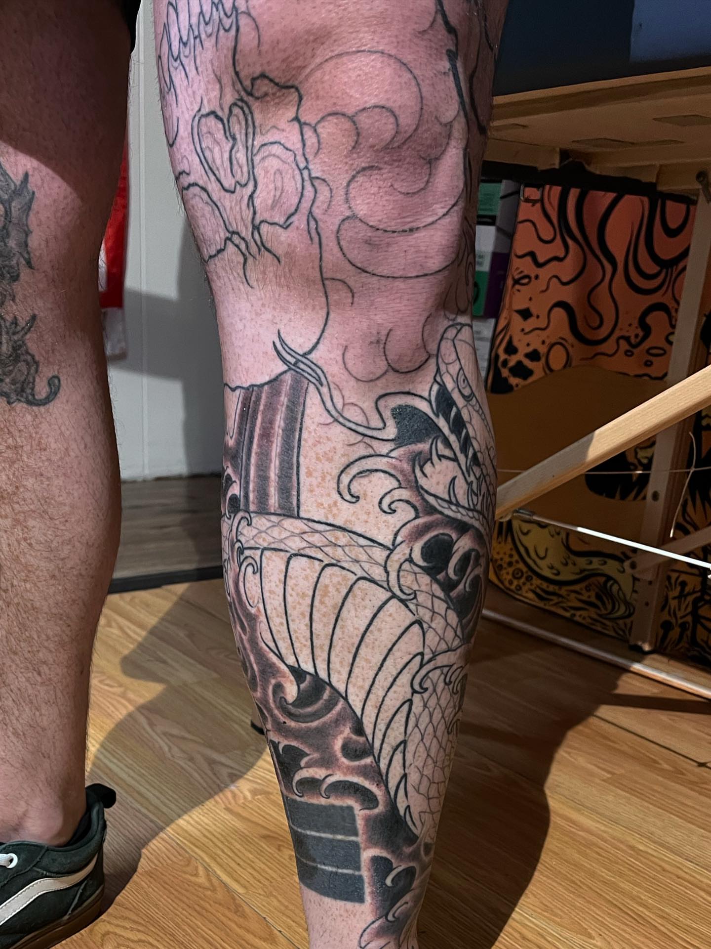 Dragon and wave japanese irezumi tattoo on the leg by TYP 419, Toledo, Ohio