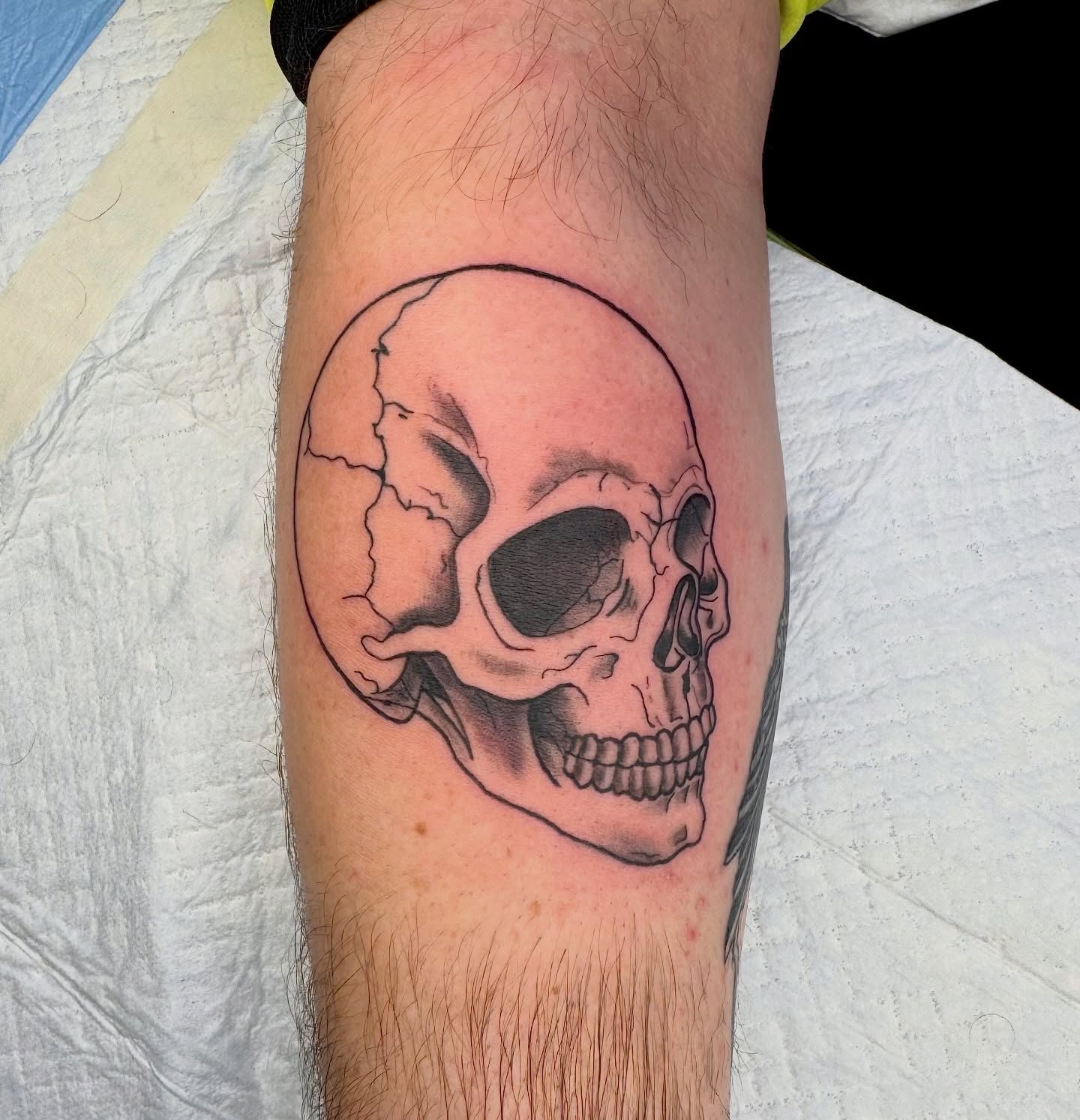 Skull realism tattoo on the forearm by Minxxy Tattoos