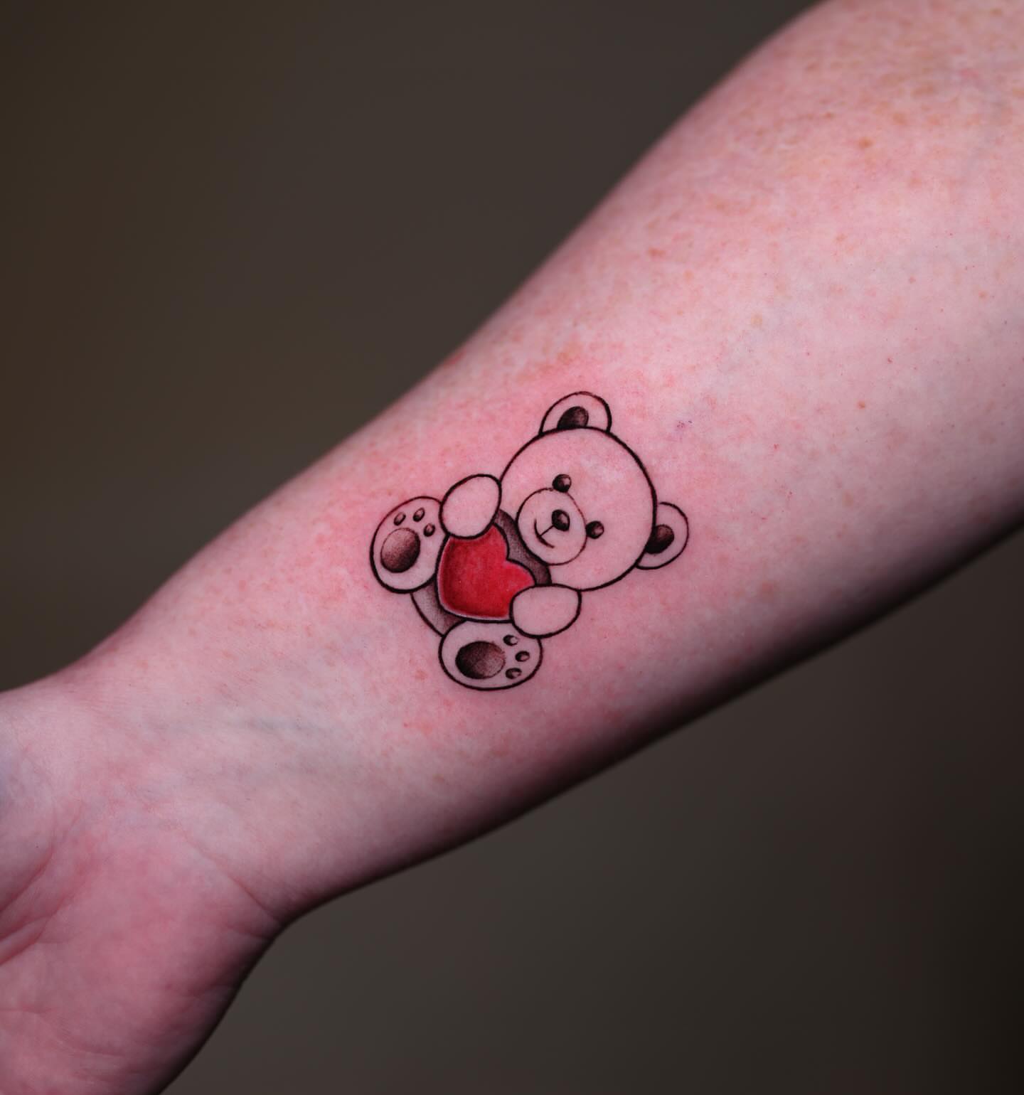 Teddy bear dotwork tattoo on the forearm by Navei