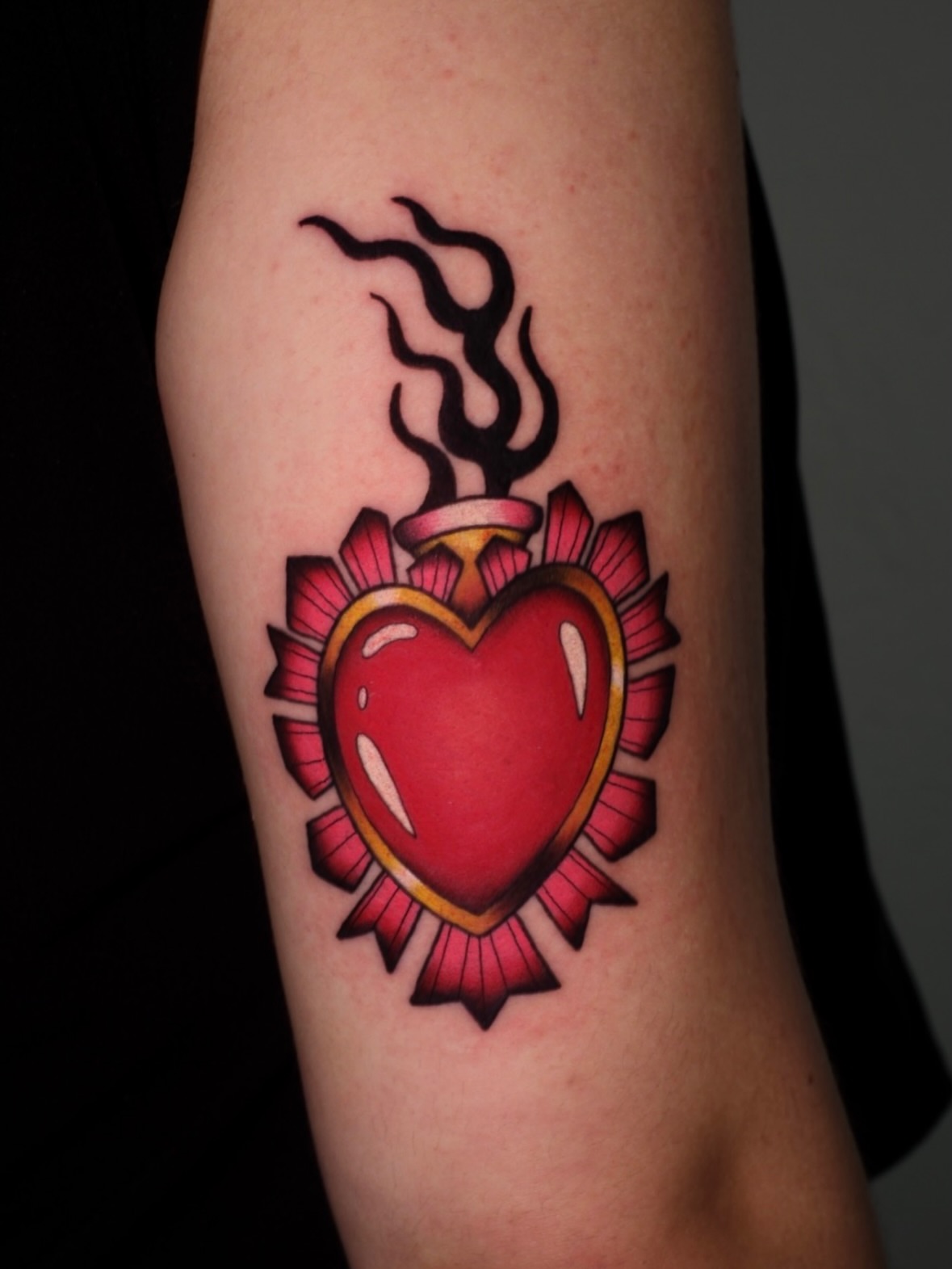 Heart with steam American traditional tattoo on the forearm by Mallory Murphy, Denton, Texas
