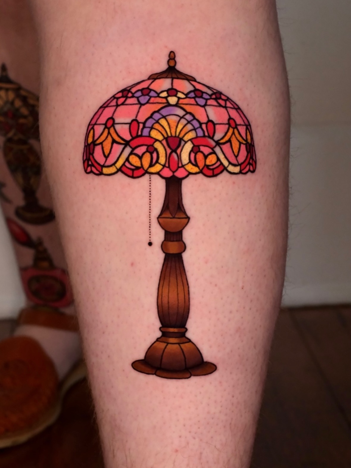 Stained glass lamp ornamental tattoo on the forearm by Mallory Murphy, Denton, Texas