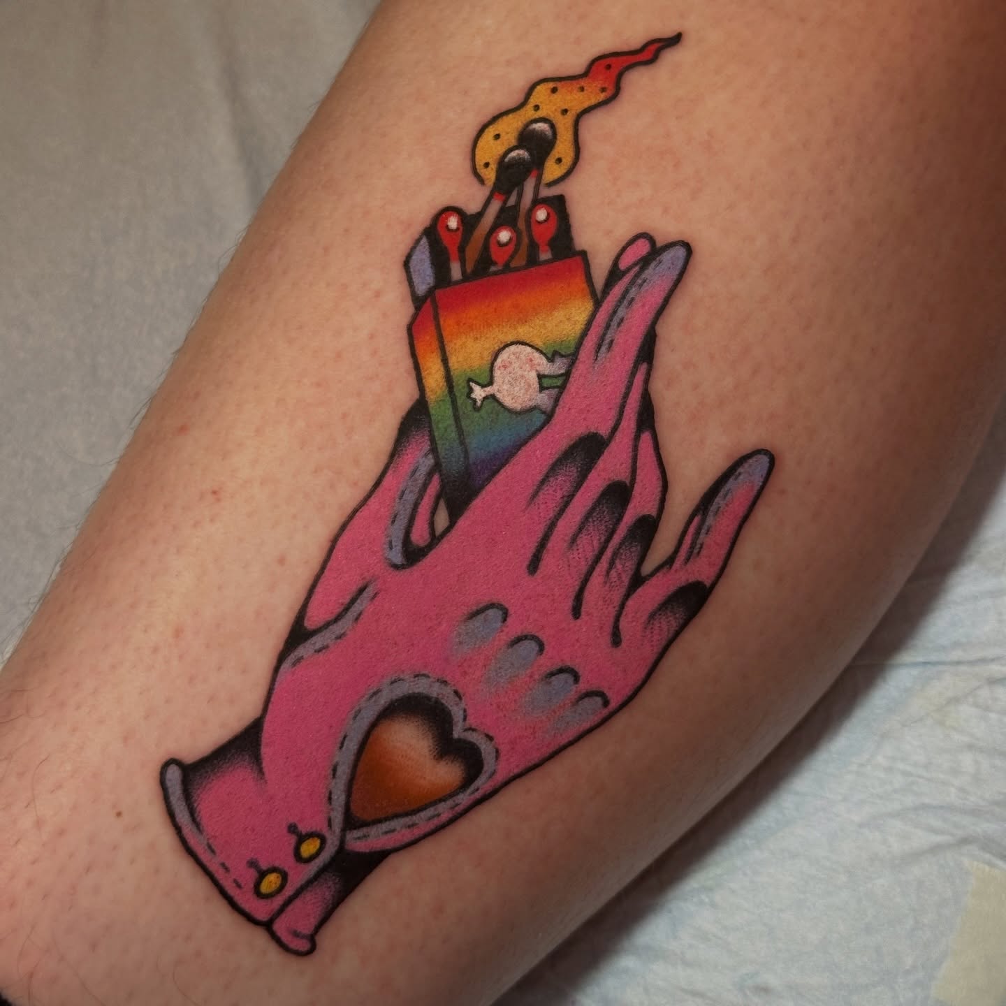Hand holding a candle American traditional tattoo on the forearm by kira
