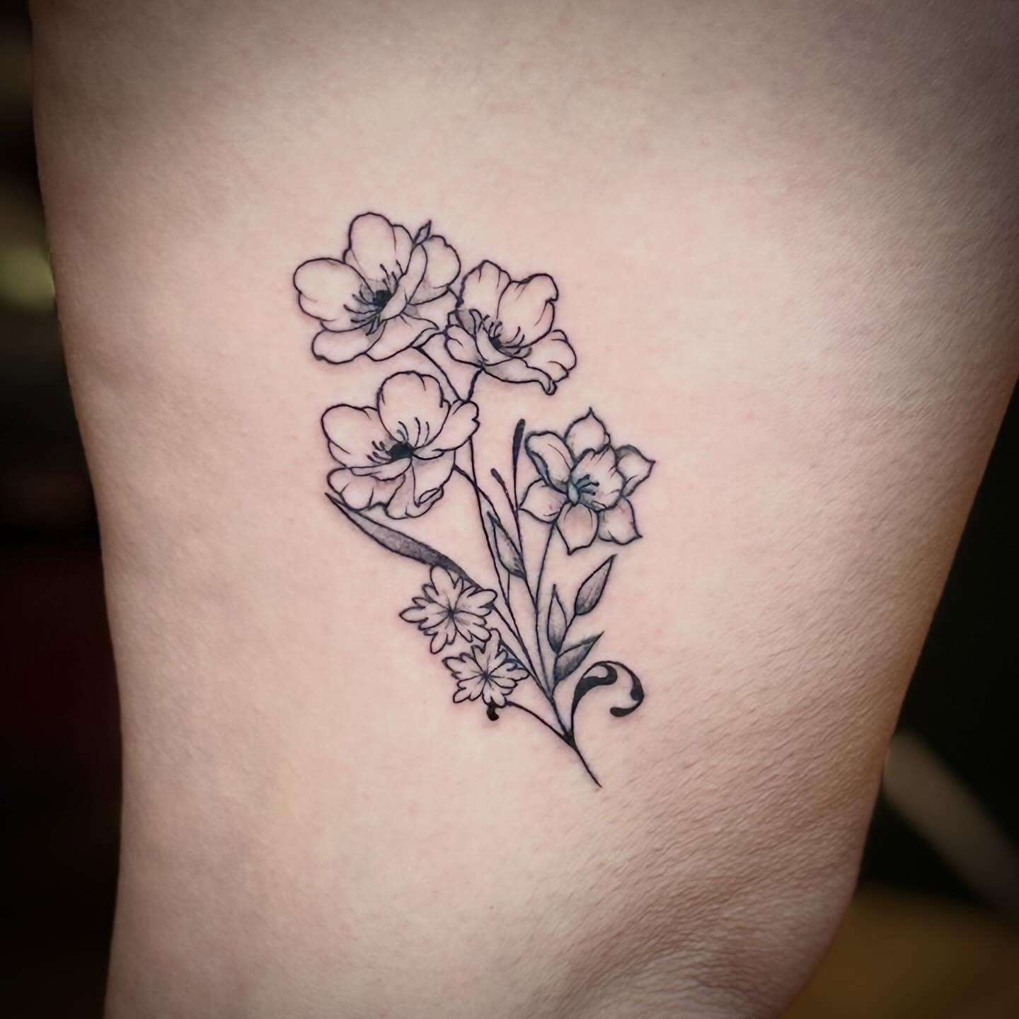 Flowers black and grey tattoo on the thigh by Taytum Marsing, Salt Lake City, Utah