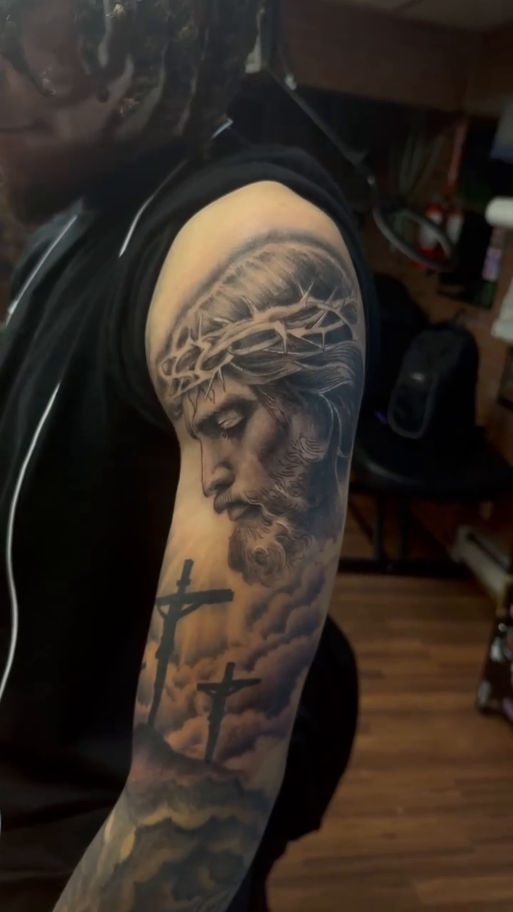 Jesus Christ with crosses realism tattoo by Marvin Osorno