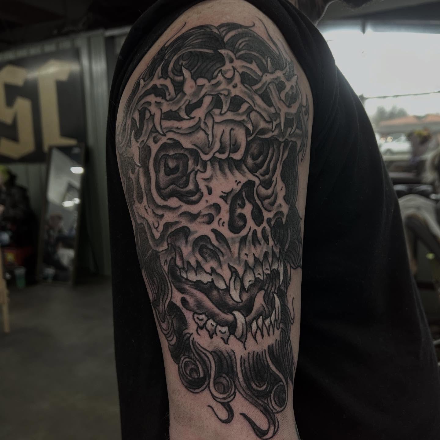 Skull dark realism tattoo on the forearm by Dylan O'Quin