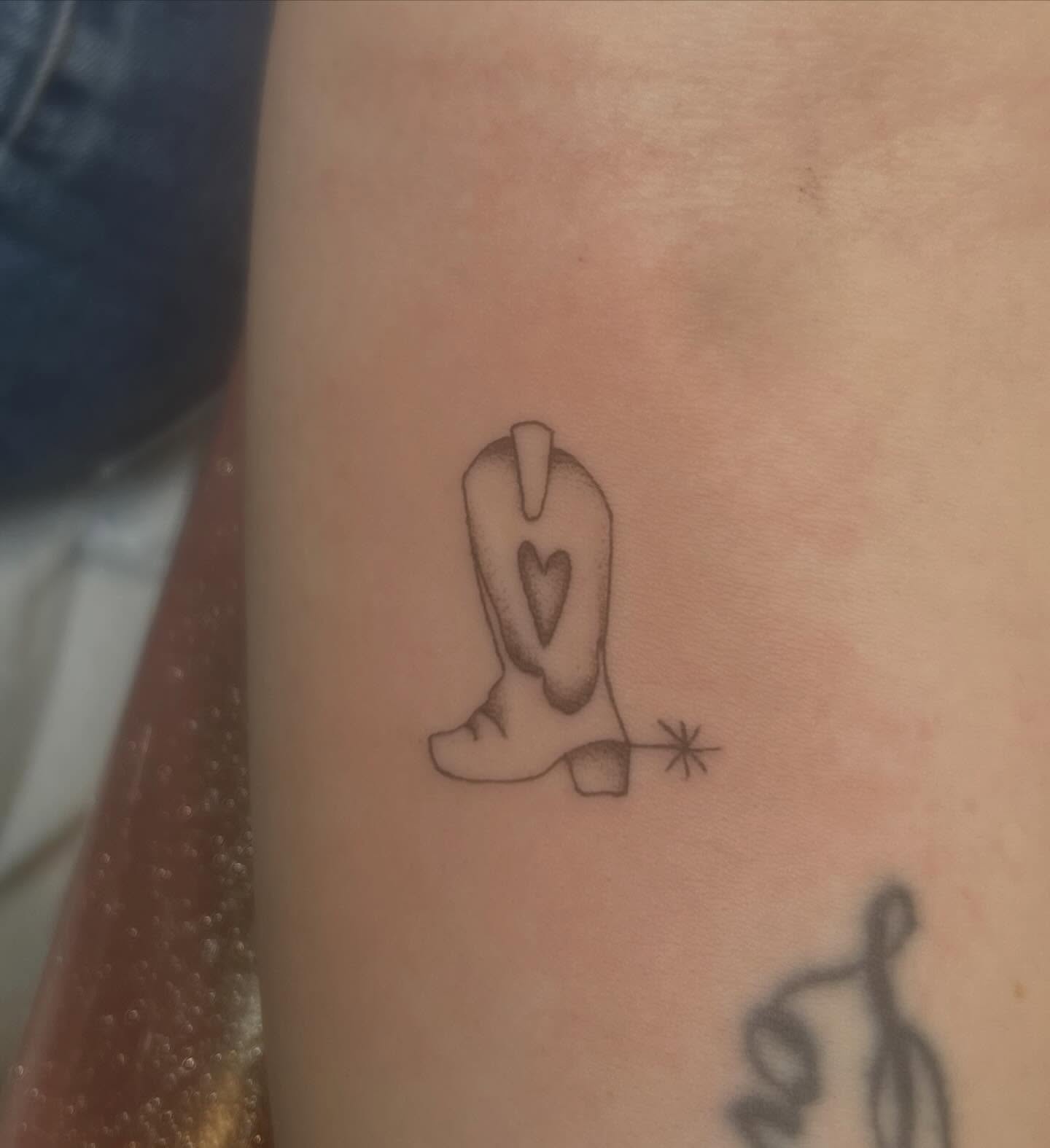 Cowboy boot black and grey tattoo on the forearm by Erika Donn, Portland, Oregon
