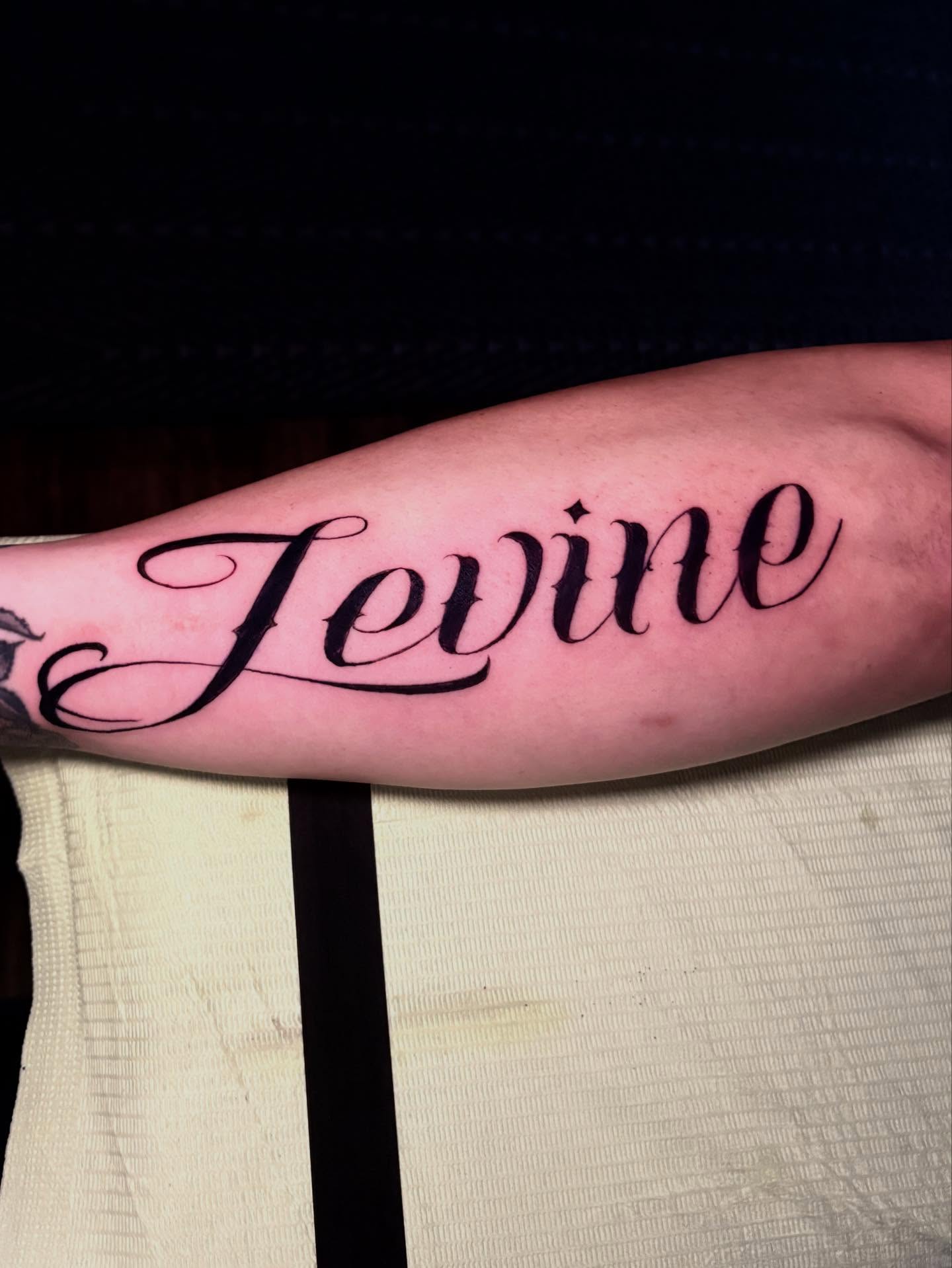 Tattoo by @sadist.guilt — lettering_script