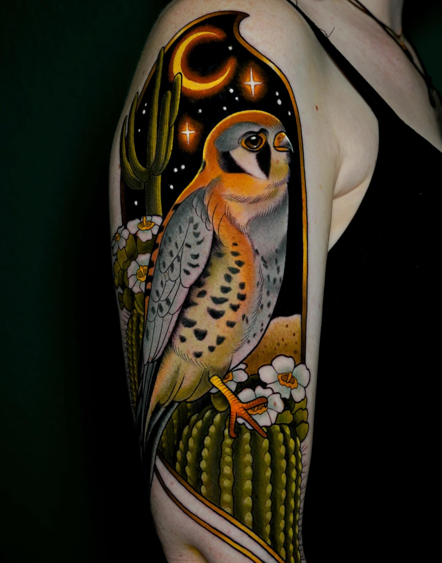 Hawk and cactus realism tattoo on the forearm by Brooke Borden